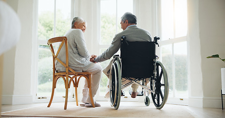 Image showing Man, wheelchair and woman comfort in home for relationship bonding, love trust or helping hand. Wife, and husband with a disability together in morning or retirement relax, care compassion or support