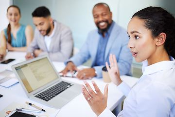 Image showing Businesswoman, team and discussion for planning in boardroom with laptop screen for feedback document. Professional, female leader and diversity with advice for collaboration, strategy or partnership