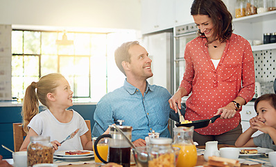 Image showing Food, breakfast and morning with a family in the dining room of their home together for health or nutrition. Mother, father and sibling kids eating at a table in their apartment for love or bonding