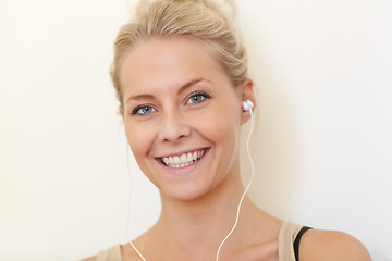 Image showing Portrait, college student and listening to music with earphones and relax with technology in home. Streaming, radio or podcast audio with headphones, tech and happy woman hearing sound in apartment