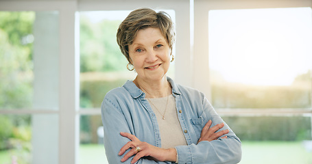 Image showing Senior woman, portrait and arms crossed in retirement, morning and home with happiness and health. Elderly, person and smile on face in house to relax with sunshine in apartment, lounge or vacation