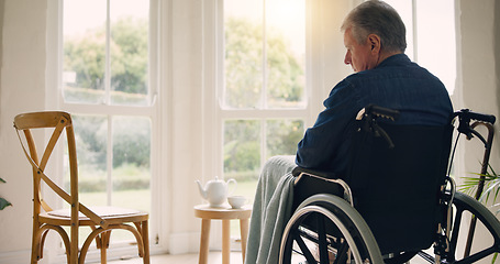 Image showing Wheelchair, senior man or thinking of memory by window in nursing home or retirement with depression. Nostalgia, sad history or lonely mature person in lounge by an empty chair to remember past loss