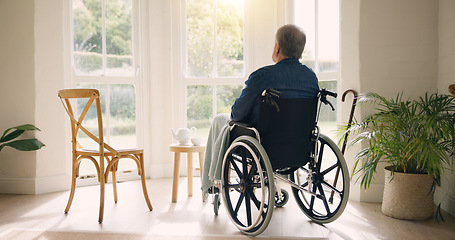 Image showing Wheelchair, old man or thinking of memory by window in nursing home or retirement with depression. Nostalgia, sad or lonely elderly person in living room by an empty chair to remember past loss
