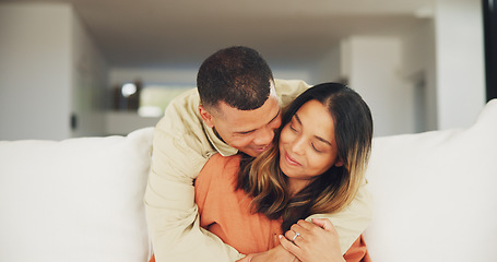 Image showing Couple, happy and living room sofa with hug, marriage and embrace with eyes closed. Home, joyful and love for commitment, bonding together and caring for romantic relationship, man and woman