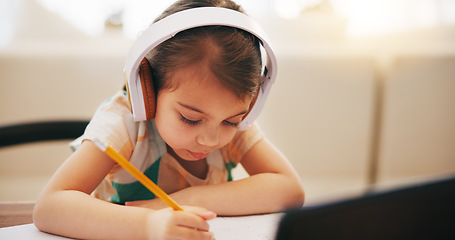 Image showing Child, writing and headphones for home education, e learning and online class on computer with audio. Girl or kid listening to virtual school, homework notes and language, translation or creativity