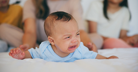 Image showing Crying, sad or baby with mother in bed for comfort, safety and attention while hungry, sick or tired. Noise, angry infant or young child upset with woman babysitter, mommy or nanny in family home