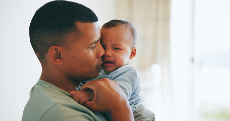 Image showing Hug, comfort and father with crying baby in a nursery with care, security and trust at home together. Love, tears and dad embrace upset newborn with colic, stress or discomfort, console or nurture