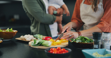 Image showing Hands, knife and vegetables on chopping board, cooking and preparation at home. Closeup of mother cutting pepper in kitchen, organic salad and family food for healthy vegan diet, nutrition and dinner