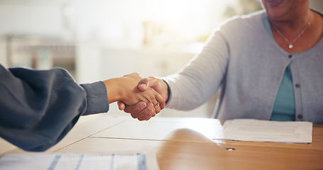 Image showing People, handshake and meeting for retirement plan, documents or paperwork in deal or insurance at home. Closeup of senior woman shaking hands with attorney or lawyer for legal agreement at house