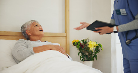 Image showing Doctor, tablet and senior woman in bed with consultation, health insurance and discussion on diagnosis in clinic. Elderly person, healthcare and nurse with tech for explain, medic report in hospital