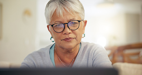 Image showing Laptop, home and senior woman online for internet banking, life insurance and mortgage payment. Reading screen, retirement and elderly person on computer for networking, communication and website