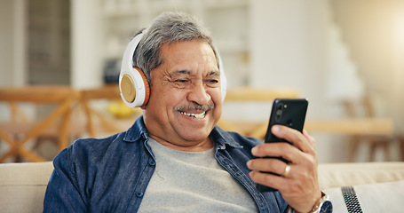 Image showing Senior, happy man and headphone for video call in living room by internet, web or app. Elderly person, smile and technology for connectivity, cellular or network with mobile for communication in home