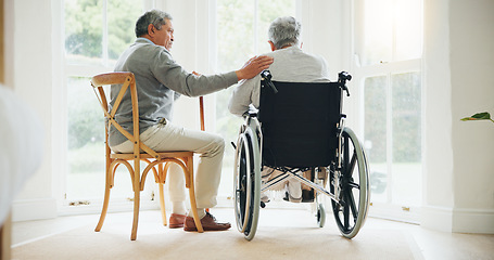 Image showing Elderly man, comfort and woman in wheelchair, touch and support partner in retirement with love. Senior couple, care and hand for together in marriage, sickness and health for wellness in family home