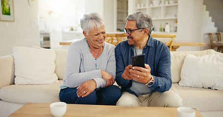 Image showing Senior couple, cellphone and social media in living room sofa, conversation and smile. Grandparents, technology and communication for laughing, man and woman in retirement, happy and connection