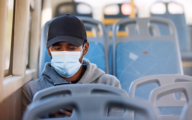 Image showing Man, mask or travel in bus with phone, cold protection or technology for social media on trip. Young person, cap or medical cover on mouth for flu virus, transport safety or cellphone to read ebook