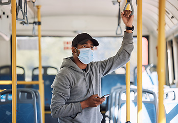 Image showing Man in bus with mask, phone and travel to city in morning, checking service schedule or social media. Public transport safety in covid, urban commute and person in standing with smartphone connection