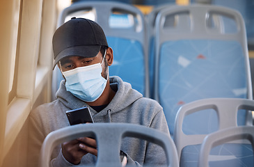 Image showing Man in bus with mask, phone and morning travel in city, checking service schedule or social media post. Public transport safety in covid, urban commute and person in seat with smartphone connection.