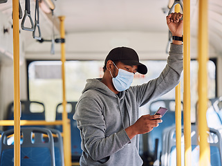 Image showing Man in bus with mask, mobile app and travel to city in morning, checking service schedule or social media. Public transport safety in covid, urban commute and person in standing with phone connection