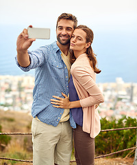Image showing Couple, hug and selfie on vacation, phone and outdoors on adventure, love and memories for social media. Happy people, smartphone and bonding or technology, travel and holiday or pout on date