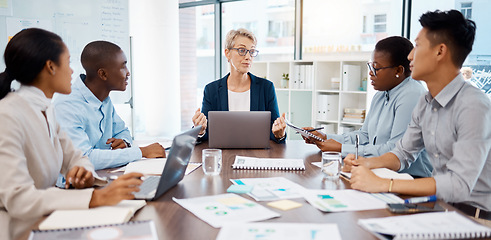 Image showing Manager meeting, employee planning and finance discussion with documents in office, conversation with team and partnership at work. Business boss talking to workers about strategy and collaboration