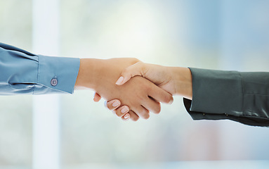 Image showing Handshake, partnership and trust in support, teamwork or deal together against a blurred background. Business people shaking hands in agreement, success and help in company greeting or welcome