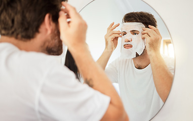 Image showing Skincare, face and facial mask on man on mirror in home bathroom. Young male with self care, beauty or cosmetic cleaning for skin health and wellness for anti aging moisturizer product for detox