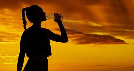 Image showing Shadow, sunset and silhouette woman drinking water for marathon running, fitness exercise and hiking workout on outdoor orange sky. Healthy, thirsty and sports athlete drink bottle for wellness rest