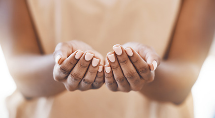Image showing Charity, open hands and a praying woman in a christian worship church for spiritual wellness. Closeup of palms of an african girl in poverty with give and receive gesture at a community support event