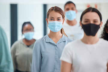 Image showing Compliance, workers and covid rules in an office with colleagues social distancing and standing in unity. Trust, management and safety by ambitious employee working through a pandemic together