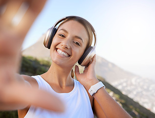 Image showing Social media, influencer and portrait of woman listen to music and creating online content of scenic mountain views. Fitness, travel and blog with a happy, relax girl posing for a photo in zen nature