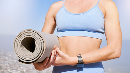 Image showing Exercise, health and a yoga mat with woman training in nature, cardio and zen workout. Energy, freedom and scenic views closeup female relax before meditation and stress relief workout for balance