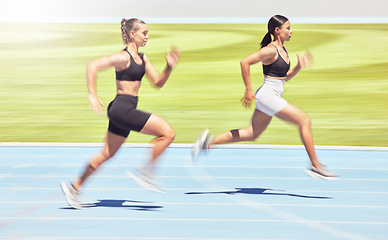 Image showing Motivation, energy and sports women runner training at racetrack, power and speed performance outdoor together. Freedom, health and marathon practice by female competing in sprint endurance workout