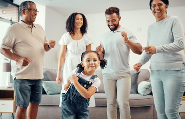 Image showing Happy, family and dancing in playful living room fun together with entertainment in happiness at home. Group of people in relationship bonding, smiling and joyful funny dance at the house
