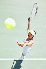 Image showing Top view, tennis court and woman serving ball in training competition, game and professional summer match. Sports athlete with motivation or vision in workout, exercise or fitness with winner mindset