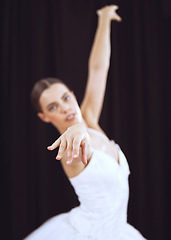Image showing Dancer performance stage to ballet music, young theatre woman dancing and action movement posture. Concert hall, posture grace of ballerina dance on black background wall and balance body exercise