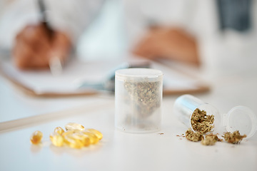 Image showing Cannabis pills, weed and medical marijuana medicine given by a professional doctor at wok with mockup space. Healthcare worker writing 420 natural drug treatment and capsule medication in hospital