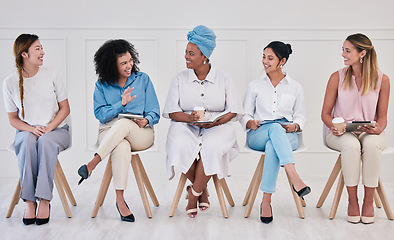 Image showing Diverse, design and marketing group of corporate woman planning and designing market strategy. Portrait of creative women designers collaborating or communicate ideas for growth in the workplace.