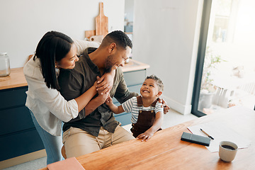 Image showing Family fun with playful, funny and happy child with a laughing parents hugging at home. Cheerful mother, father and small child with a smile relax, enjoy and spend time together at their house