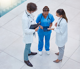 Image showing Medical, healthcare team or doctors discussing or consulting patient diagnosis or treatment in hospital. Professional medicine gp, nurse practitioners or health physicians working in a clinic