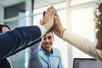 Image showing Teamwork, partnership and fun with a diverse group joining hands for a high five during team building. Colleagues uniting and showing support, community and global collaboration in an office