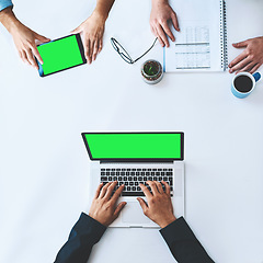 Image showing Businesspeople on tablet and laptop with green screen showing marketing, advertising or copyspace from above. Top of hands typing, using wireless tech for online app, website or new modern software