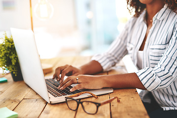 Image showing Closeup of hands typing, writing or replying on laptop while browsing or searching startup business ideas in a cafe. Creative entrepreneur, remote blogger or student with an online blog in restaurant