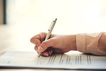 Image showing Contract, document and paper work closeup of businesswoman signing, writing or filling out personal information, insurance or job form. Professional reading recruitment paperwork at a hiring company