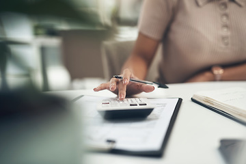 Image showing Accountant, finance and business woman calculating a budget or expense in her office. Closeup of a financial advisor planning tax payment, savings or investment for a company using a calculator
