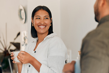 Image showing Woman drinking coffee, having conversation and bonding with her husband at home. Smiling, happy and relaxed wife enjoying quality time, romantic and peaceful moment as a couple in loving relationship