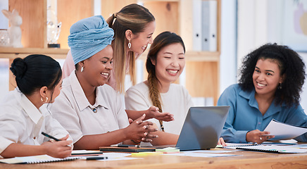 Image showing Multicultural females only talking and planning business strategy and growth together in a meeting at the office. A happy marketing team of women collaborating on a project and working on a proposal