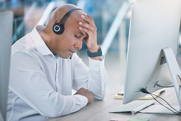Image showing Stressed, tired and headache of working sales consultant, call center agent or customer service advisor. Overworked, worried or frustrated phone operator employee at contact us helpdesk agency