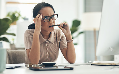 Image showing Confused, stress and frustrated worried financial planner, accountant upset and worried budget at work with a computer, notebook and plan form. Anxious female with finance, money problems and issue