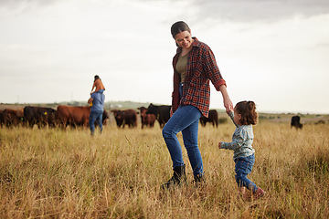 Image showing Sustainable farming family, cows on agriculture farm with rustic, countryside or nature grass background. Farmer mother, dad and kids with cattle or livestock animals for dairy, beef or meat industry