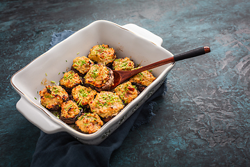Image showing Oven baked stuffed mushrooms - champignons with cream cheese and dried tomatoes in casserole